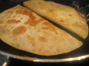 Flip tortillas on to other side and cook two more minutes.