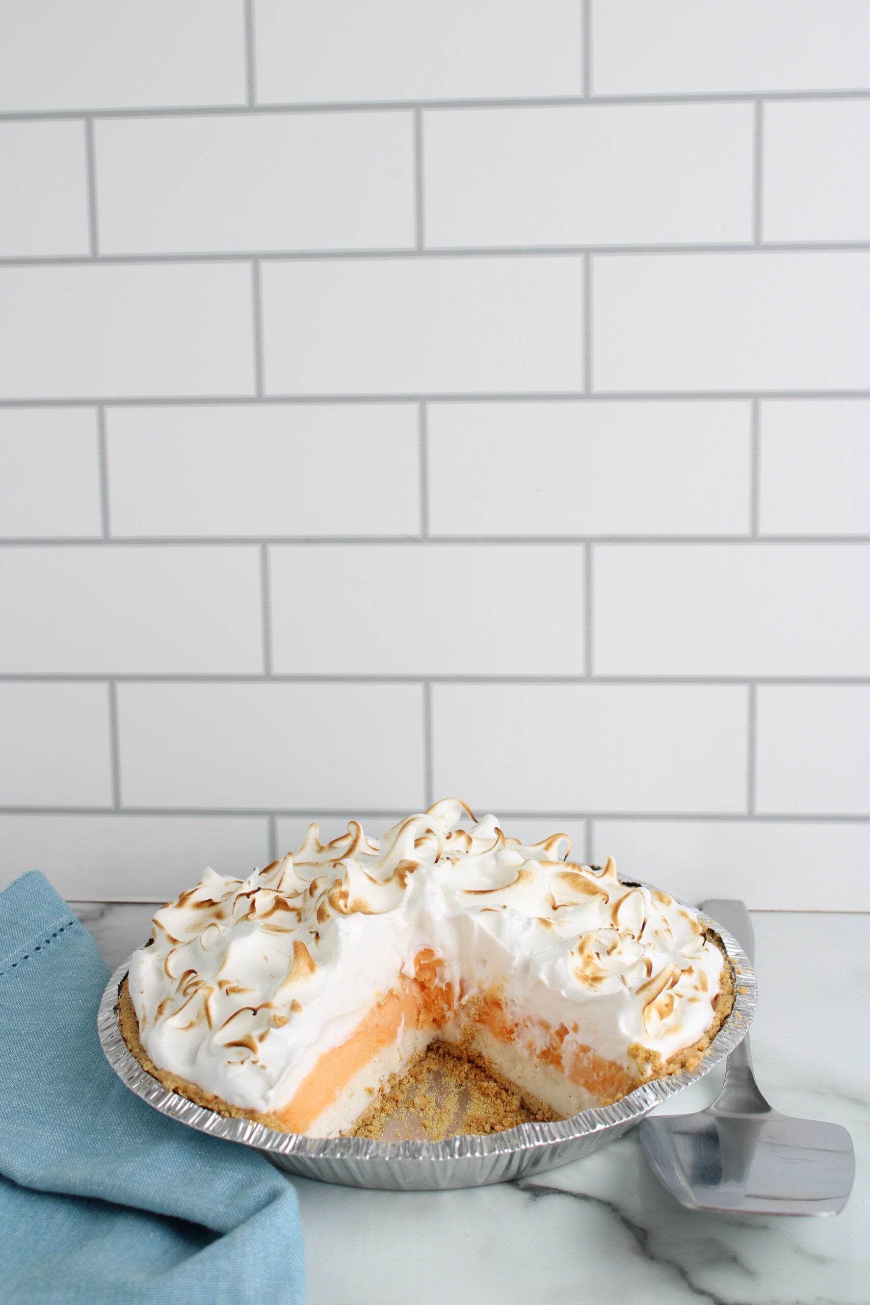 dreamsicle pie with piece cut out