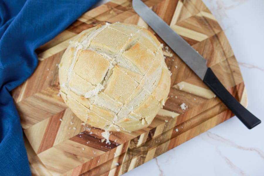 cut sourdough bread on cutting board
