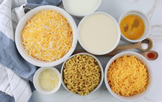 Slow Cooker Macaroni and Cheese Ingredients in White Bowls