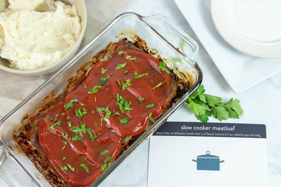 Crockpot Meatloaf in glass dish with mashed potatoes 