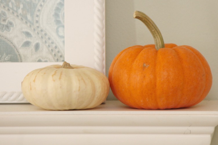 Pumpkins on a mantle
