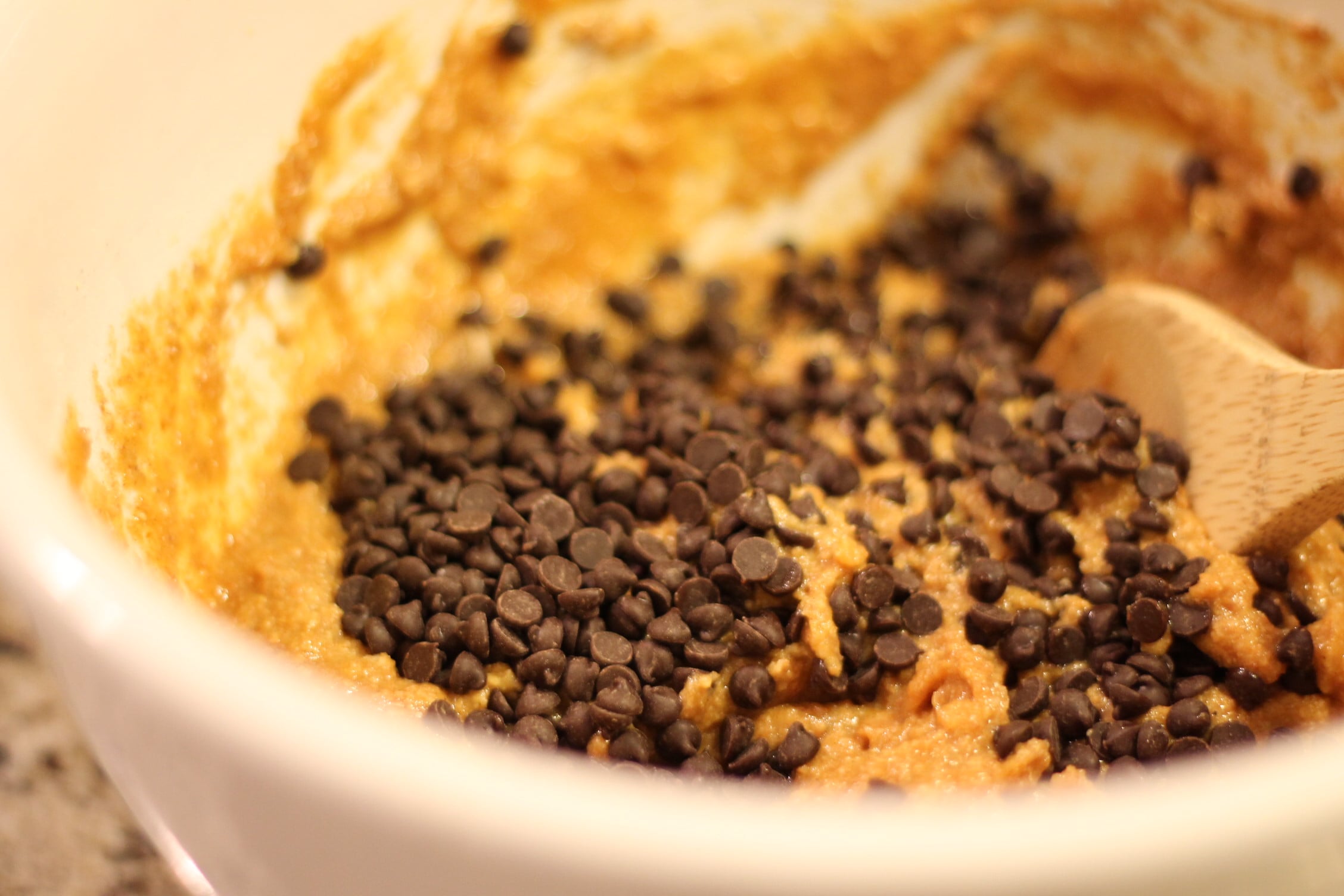 Mixing Mini Chocolate Chips in Pumpkin Batter 