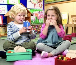 kids eating uncrustables at lunch