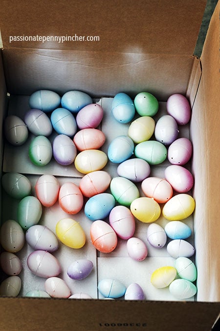 plastic easter eggs in cardboard box
