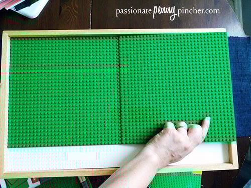 using green lego baseplates on a table 
