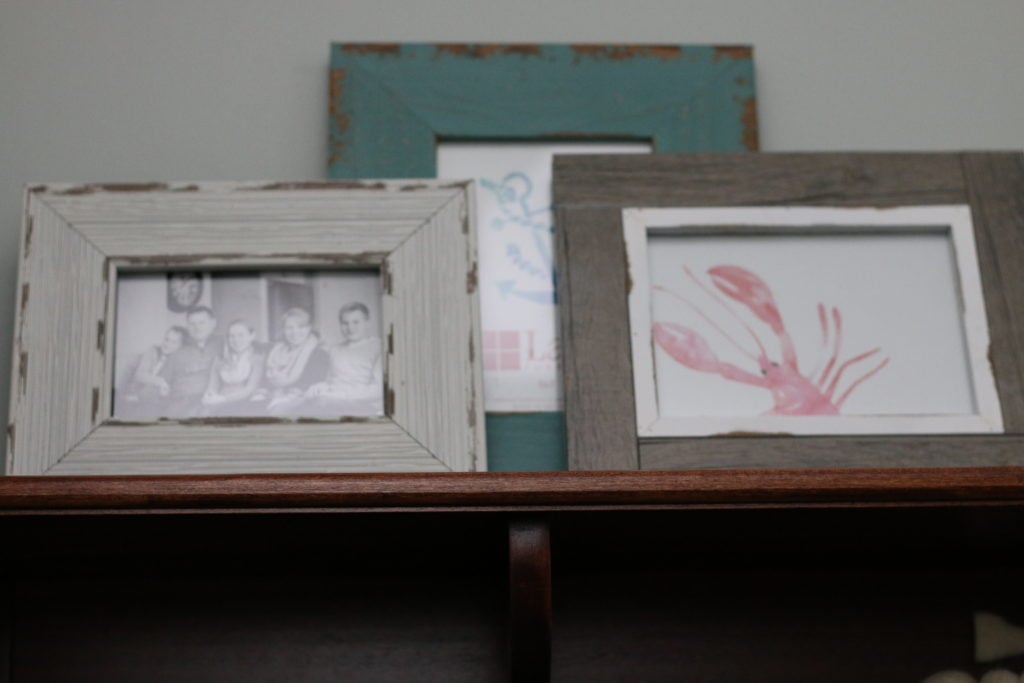 Photos on top of cabinet