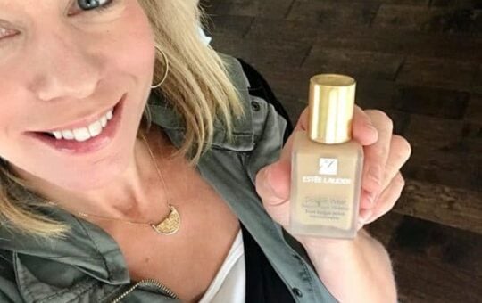 Laurie holding Estee Lauder