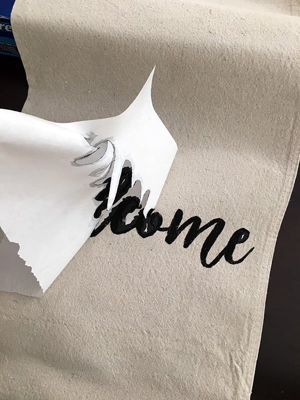 removing stencil for diy throw pillow cover 