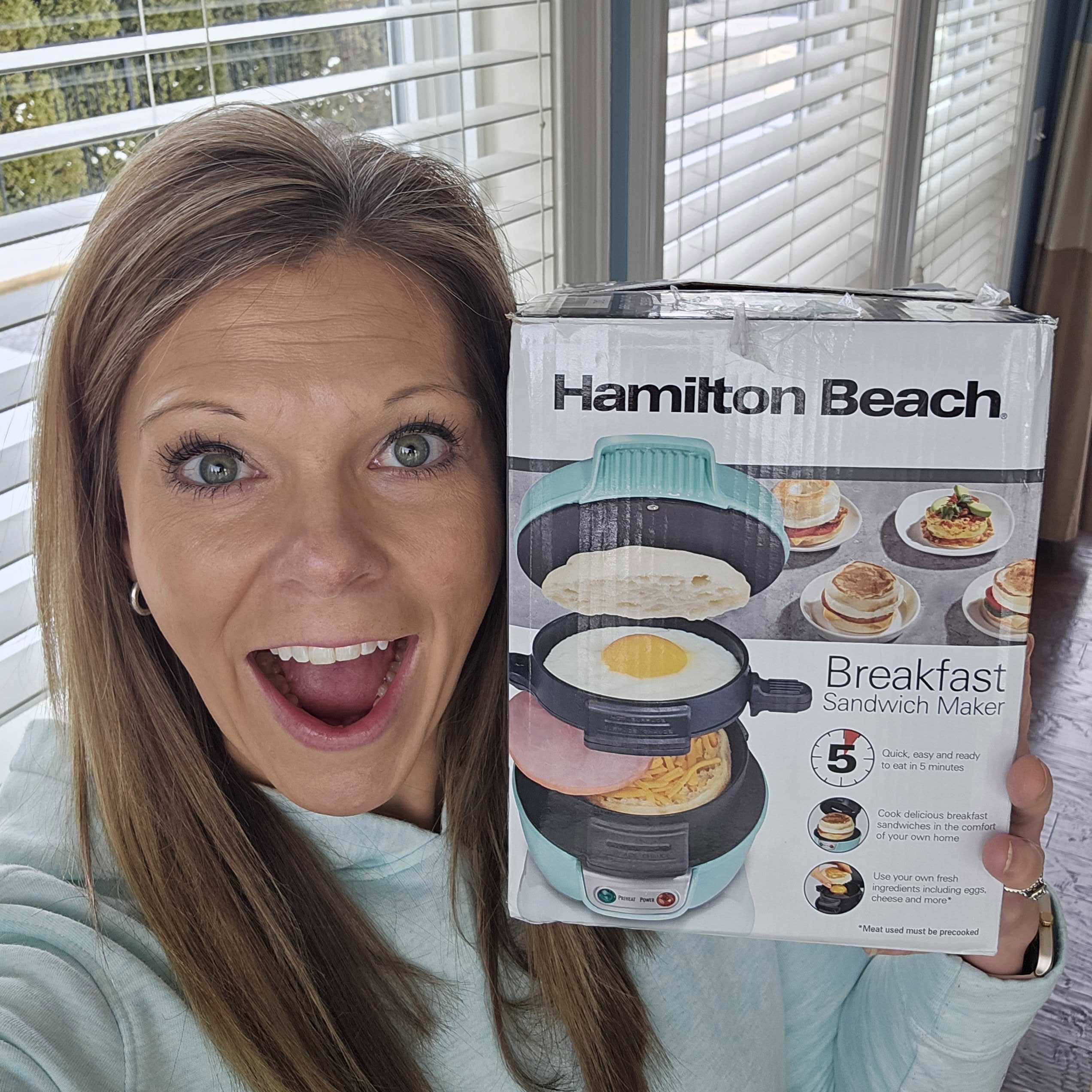 hamilton beach sandwich maker box in blue with woman smiling 