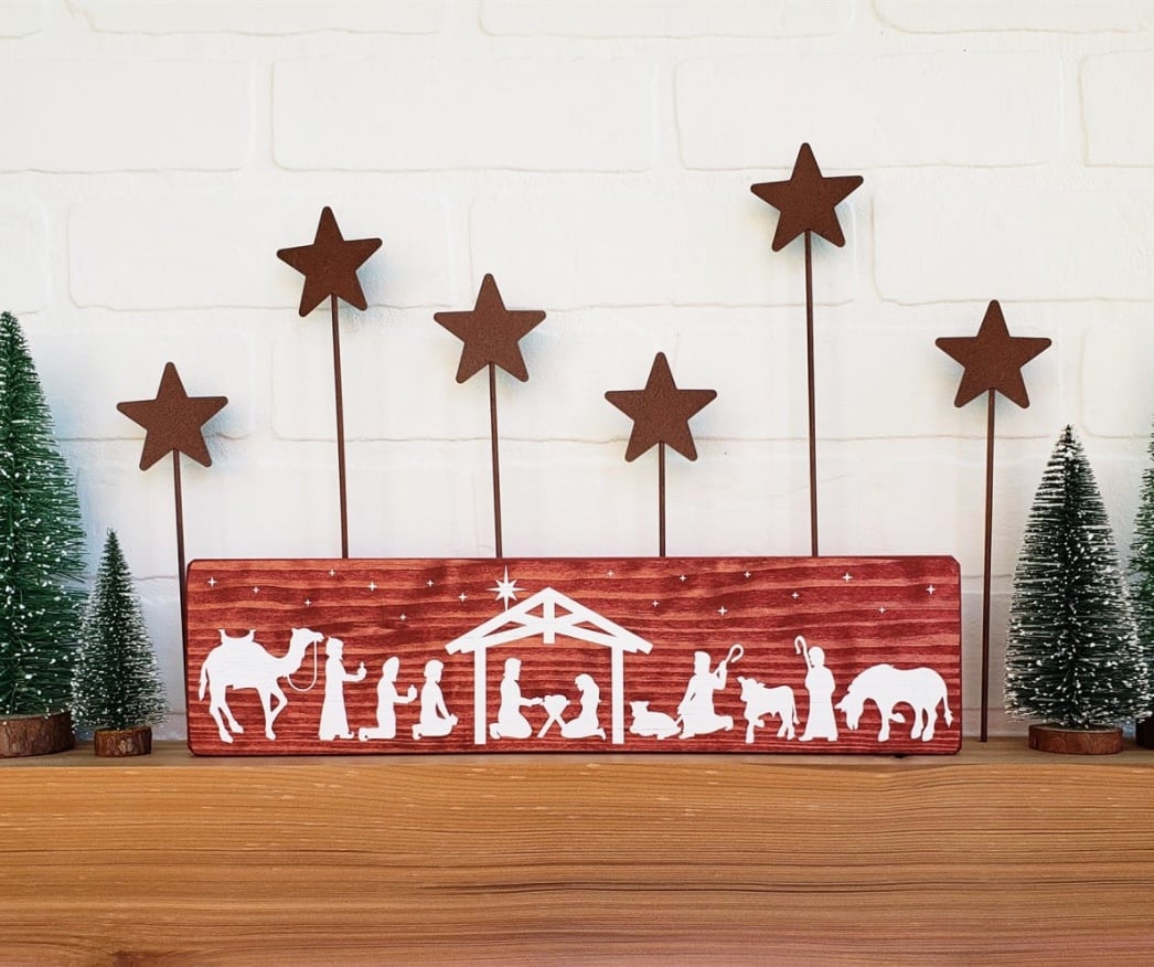 red stain wooden nativity