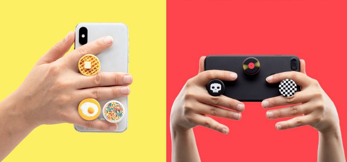 hands holding phones