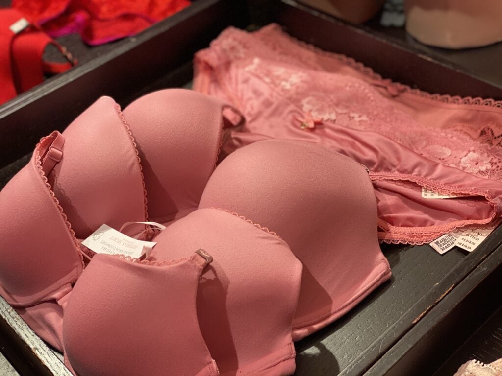 blush colored victoria's secret bras on display in store