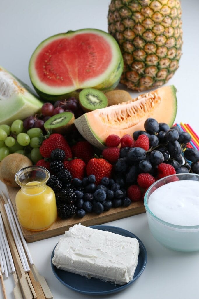 Fruits on a Platter with Ingredients for Fruit Dip 