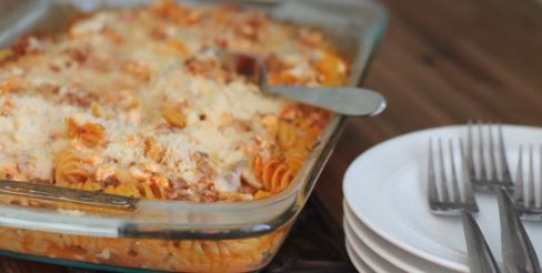 pasta bake with plates and forks