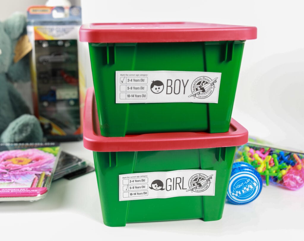 operation christmas child boxes packed and labeled boy and girl 