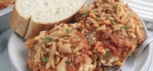 cheesy baked spaghetti on plate
