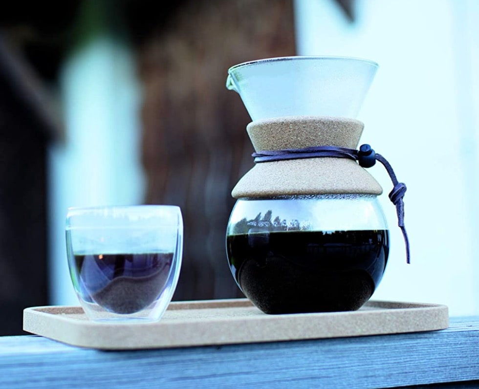pour cover coffee maker on table with cup