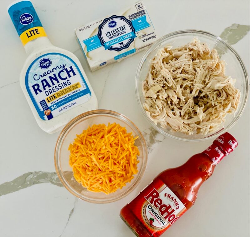 Buffalo Chicken Dip ingredients on counter 