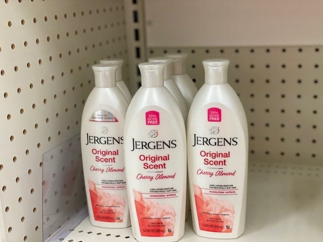 3 bottles of lotion on store shelf