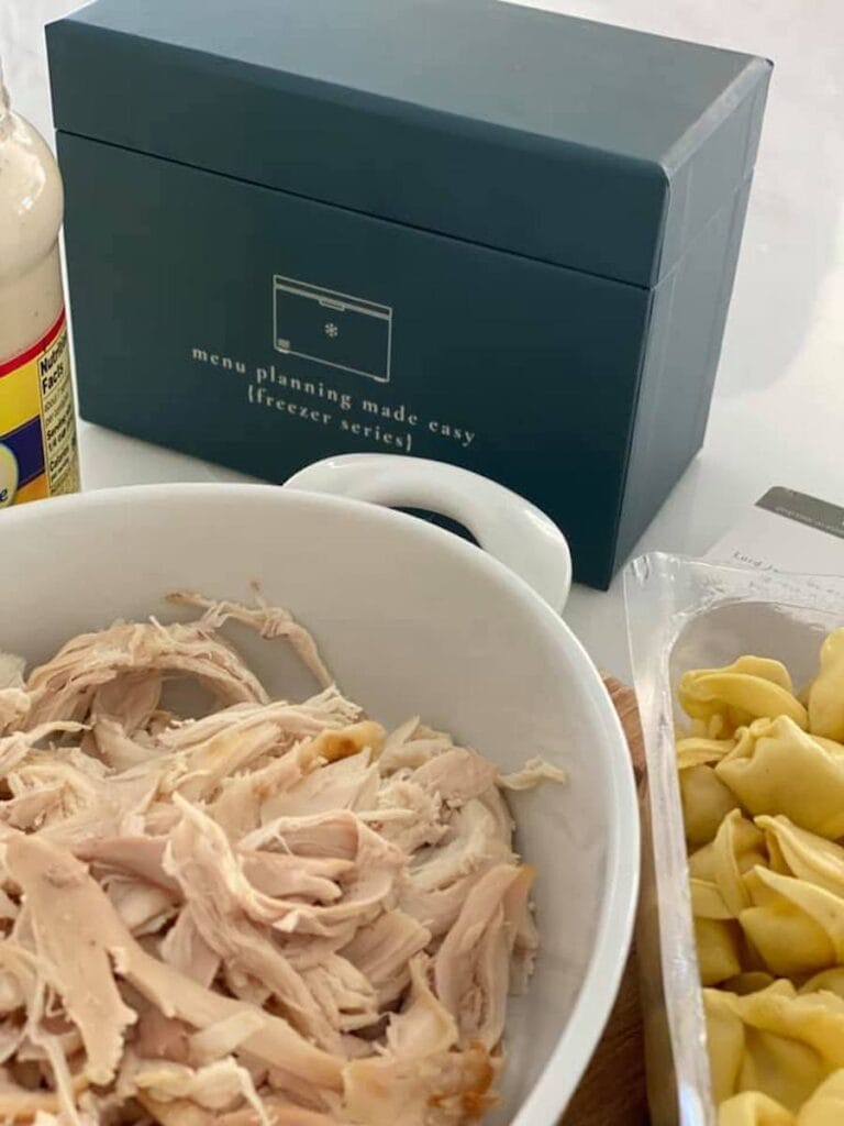 shredded chicken next to menu box