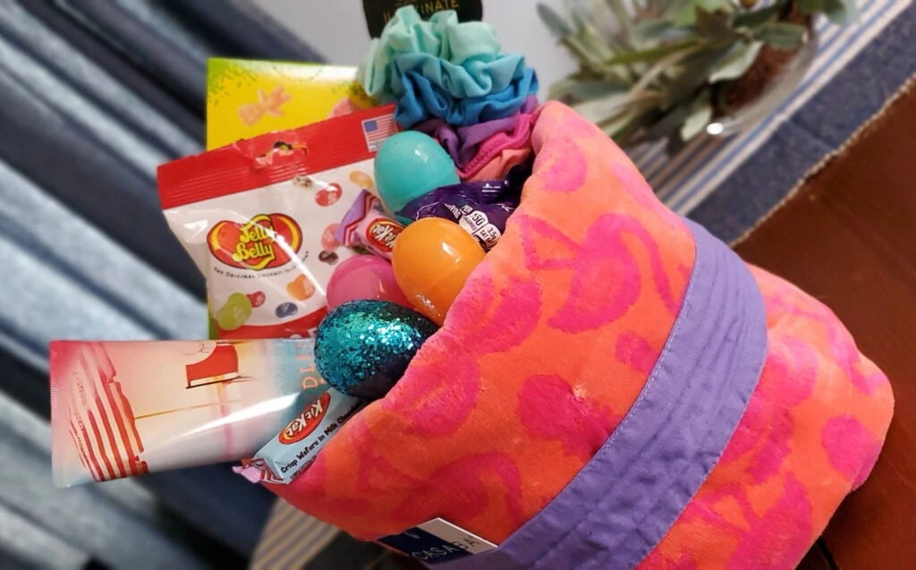 https://passionatepennypincher.com/wp-content/uploads/2021/03/beach-towel-easter-basket-1024x637.webp