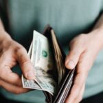 third stimulus check money in a wallet