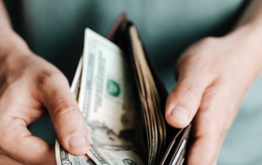 third stimulus check money in a wallet