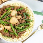 kung pao beef Finished on Plate with fork and Recipe Card