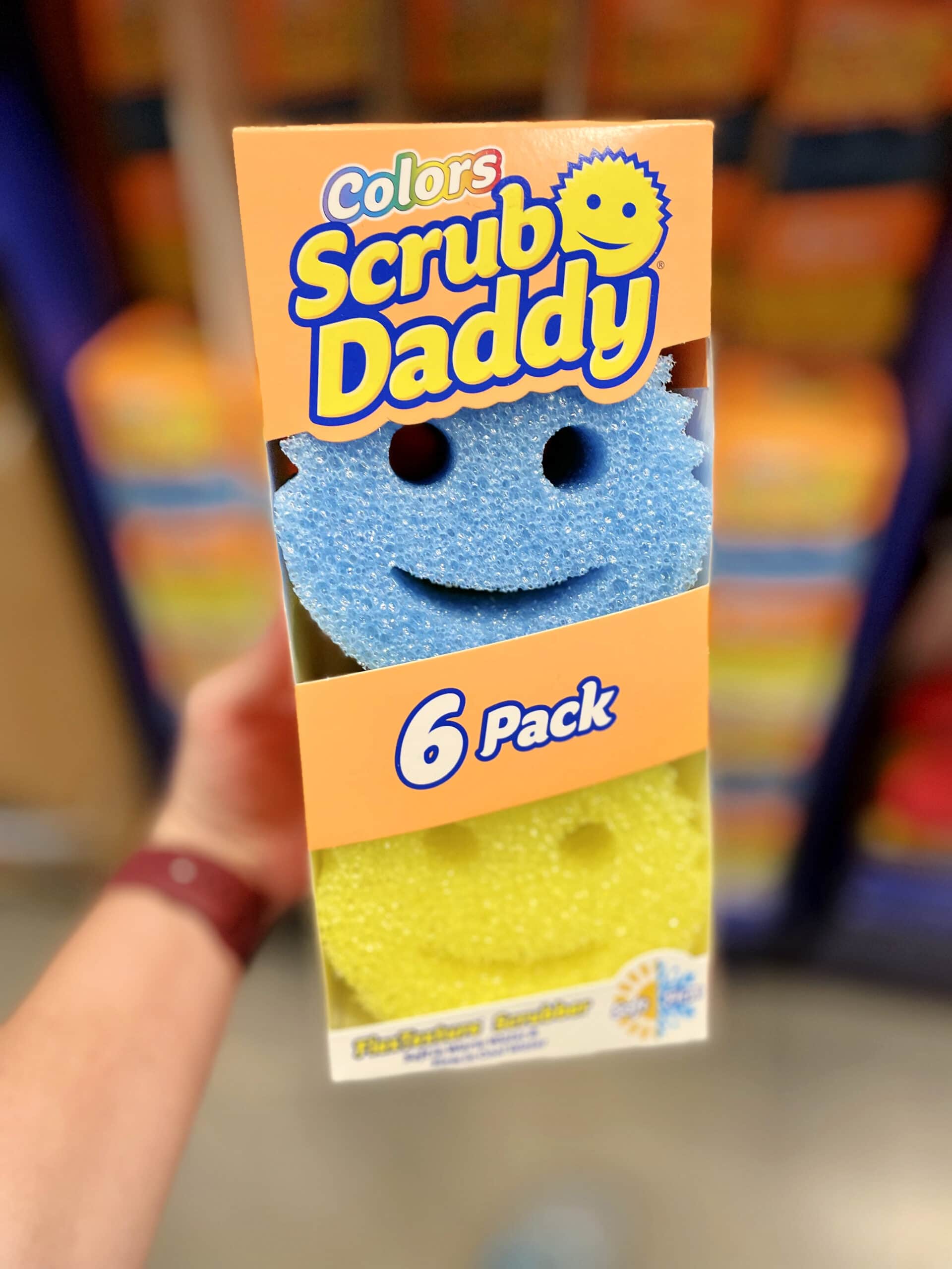scrub-daddy-colors person holding colors scrub daddy