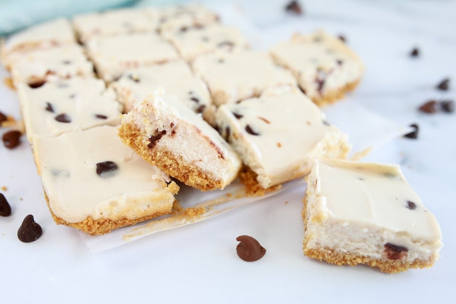 cheesecake bars close up side view of cooked cookie bar