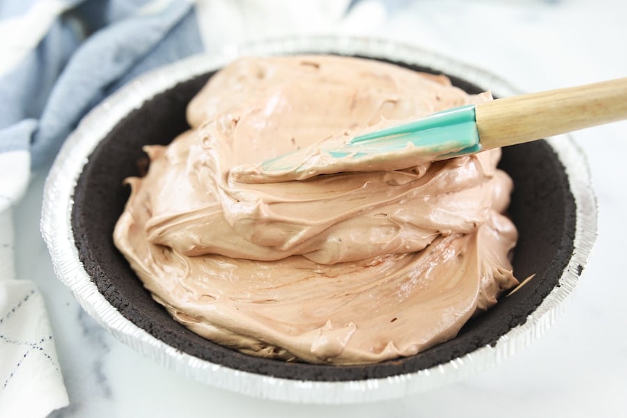 Adding Nutella Filling to Chocolate Crust for Chocolate Hazelnut Pie 