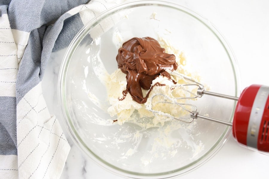Mixing Hazelnut Chocolate and Whipped Topping in Mixing Bowl