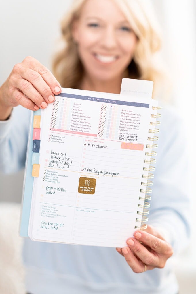 Laurie holding 2022 Planner