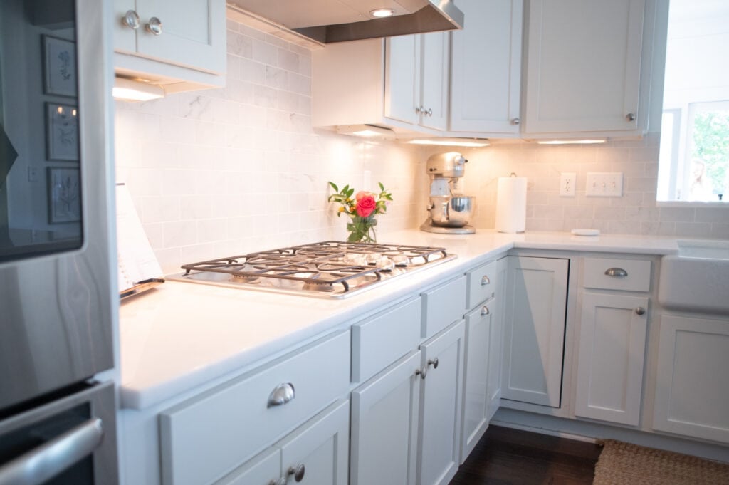 White kitchen with colorful flowers