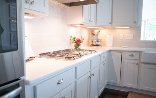 White kitchen with colorful flowers