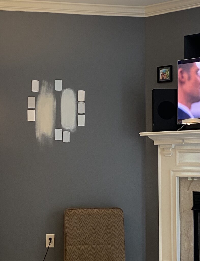 testing edgecomb gray and other paint samples on walls 