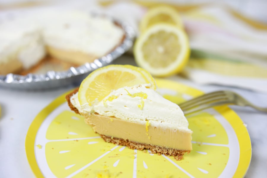 Finished Lemon Icebox Pie Slice on Pie Plate with Fork