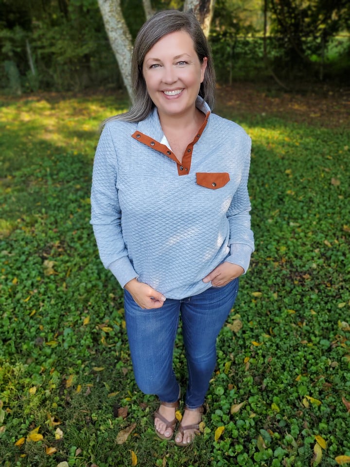 quilted snap pullover sweater on woman