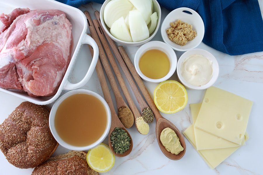 cuban pork sandwich ingredients in bowls