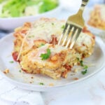 Pesto Lasagna on Plate with Fork in Lasagna