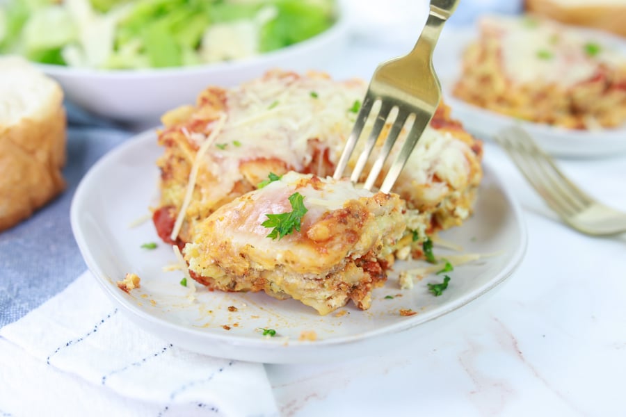 Pesto Lasagna on Plate with Fork in Lasagna