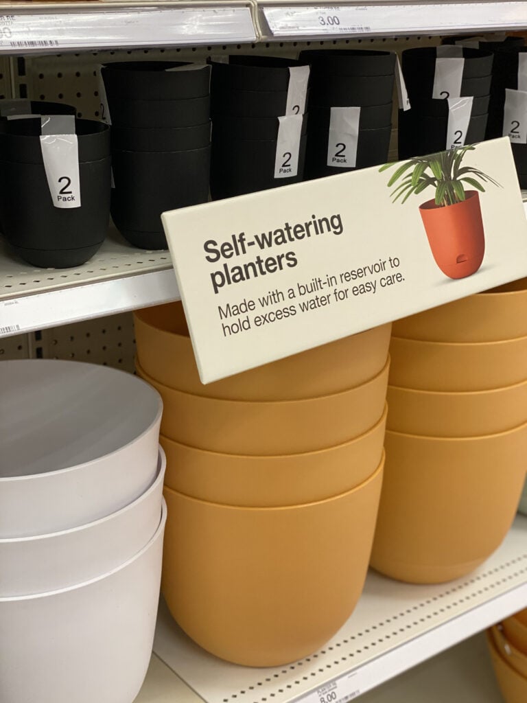 target self-watering planters on store shelf