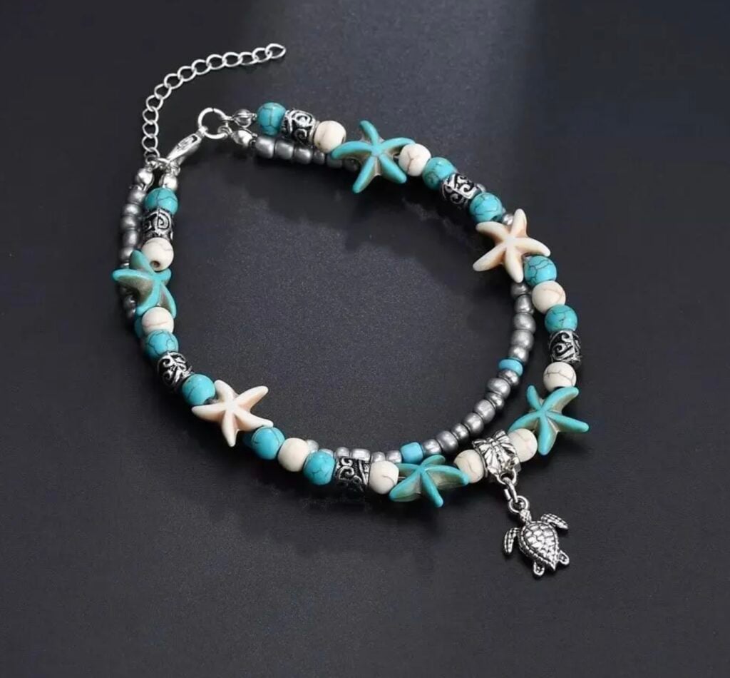 anklet on dark surface