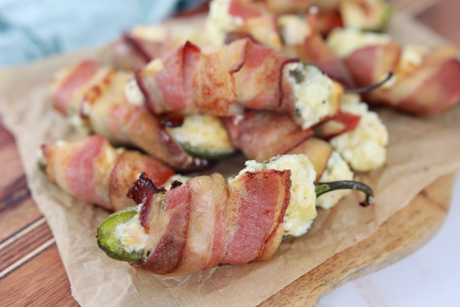 jalapeno poppers close view on wooden board