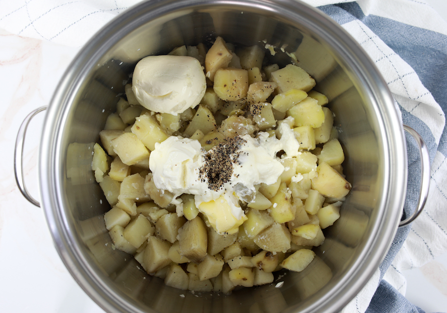 potato casserole with ingredients in stockpot
