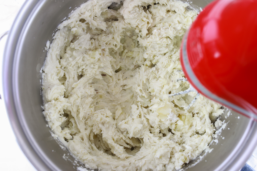 mixing potatoes with hand mixer