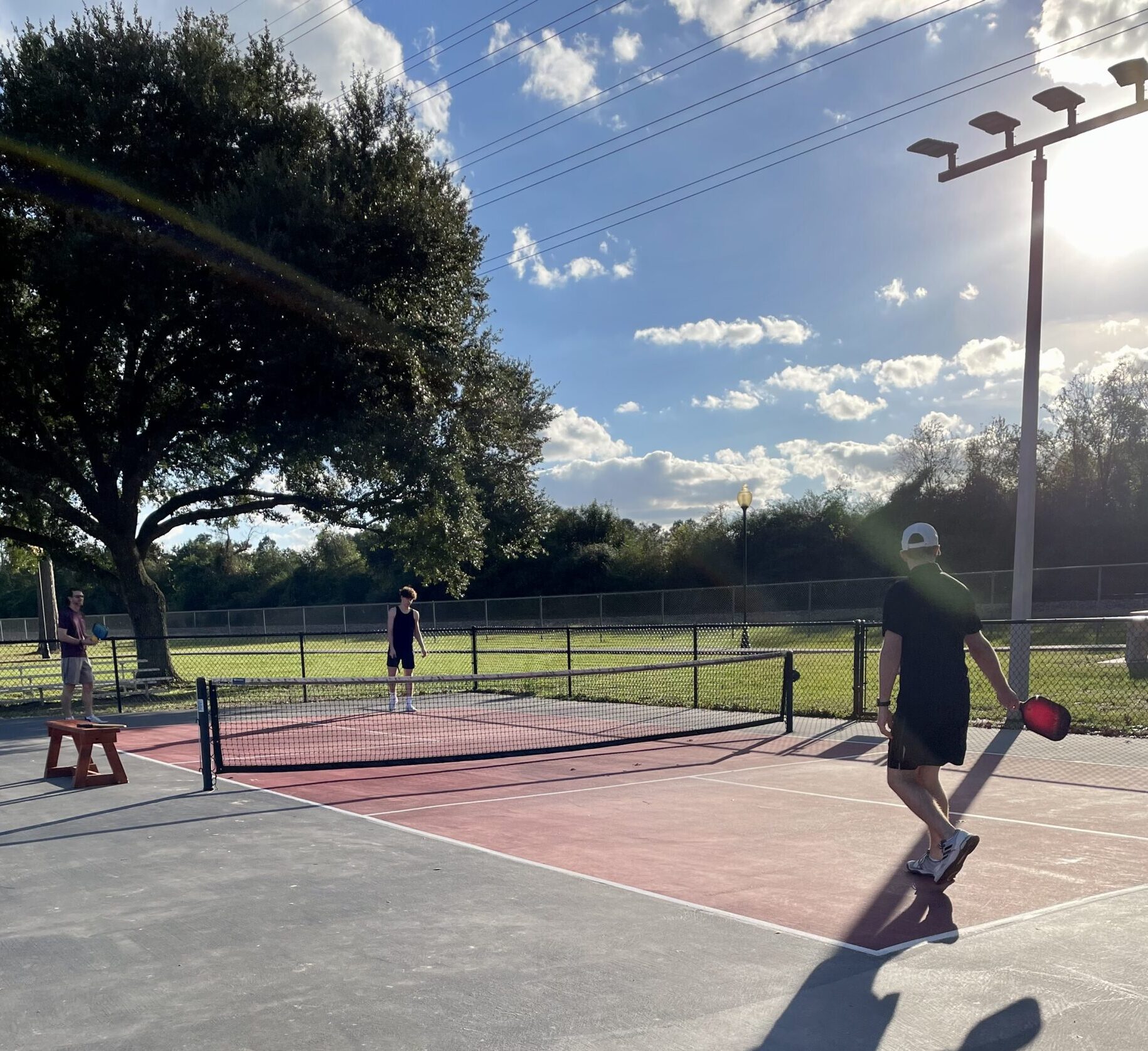 people playing pickleball on court