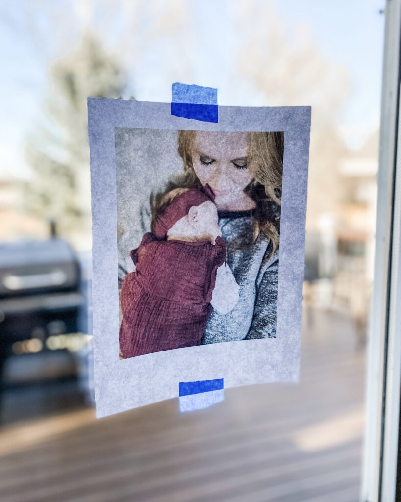 tape photo to window to trace