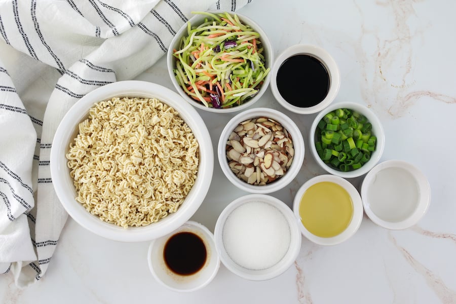 simple broccoli slaw ingredients in white bowls